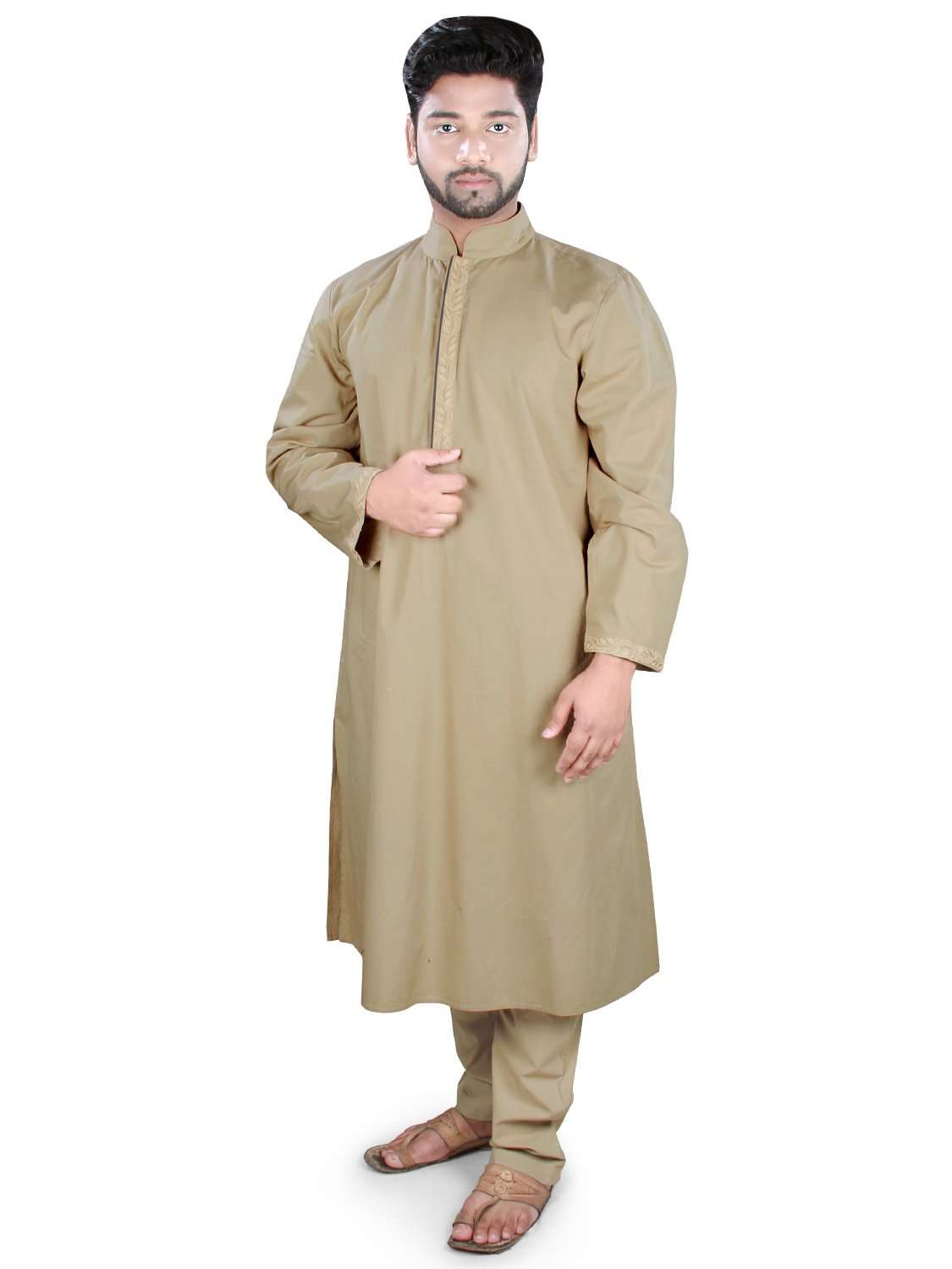 A man wearing a light beige kurta pajama set with embroidery on the neckline and sleeves, standing against a white background.