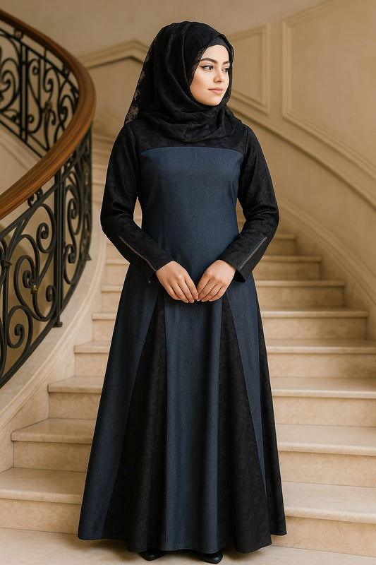 Woman in a black hijab and dark blue dress standing on a staircase.